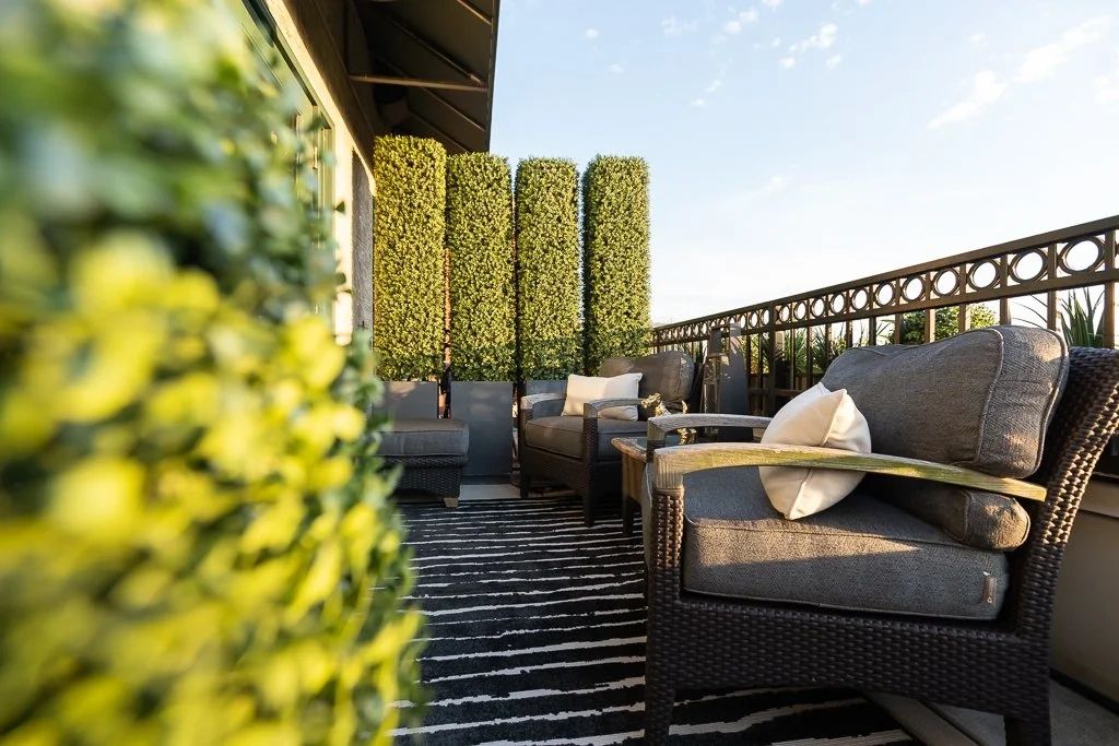 Interior by Daniel Home with sculptural greenery against a neutral wall